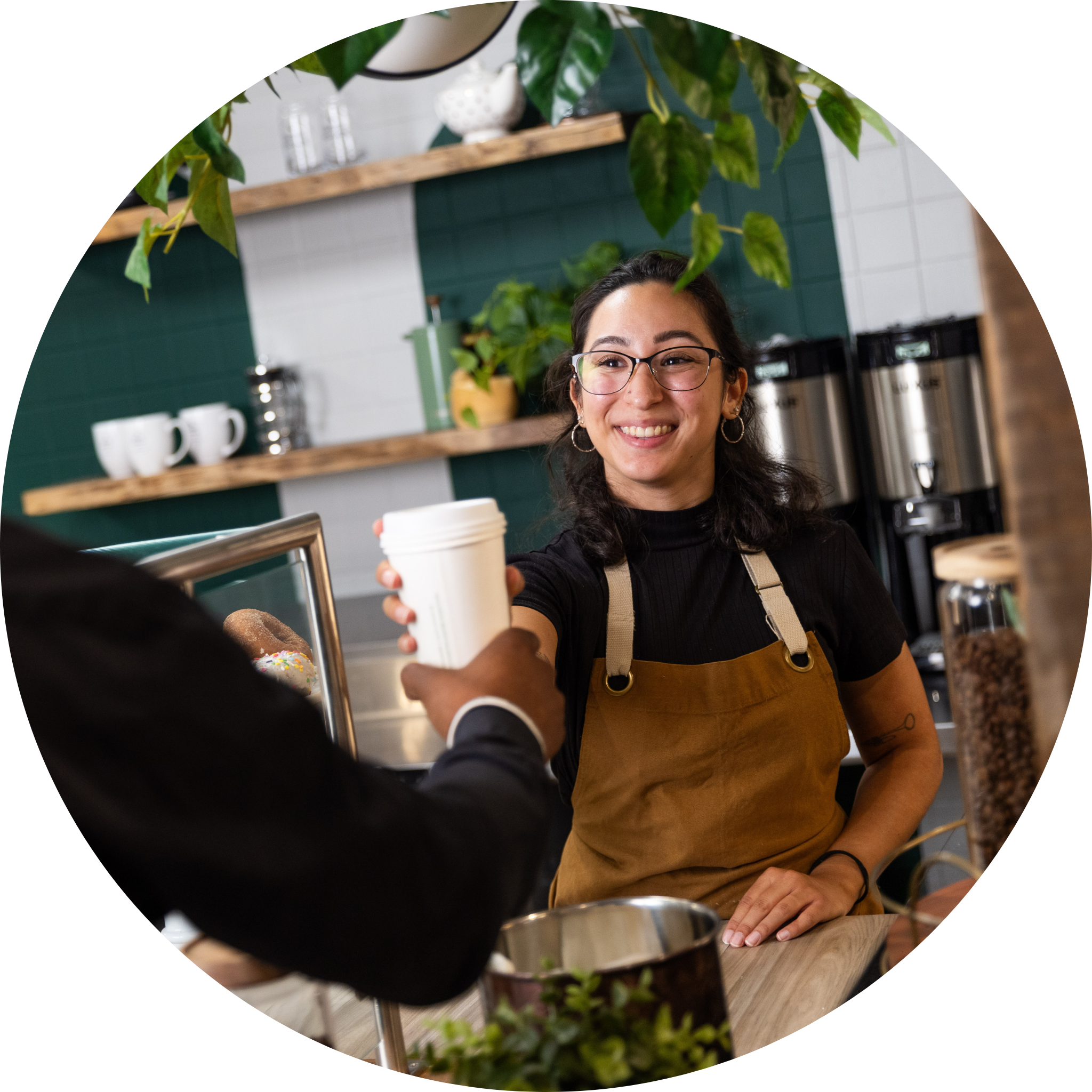 Barista handing customer coffee, barista training, customer experience, coffee and tea