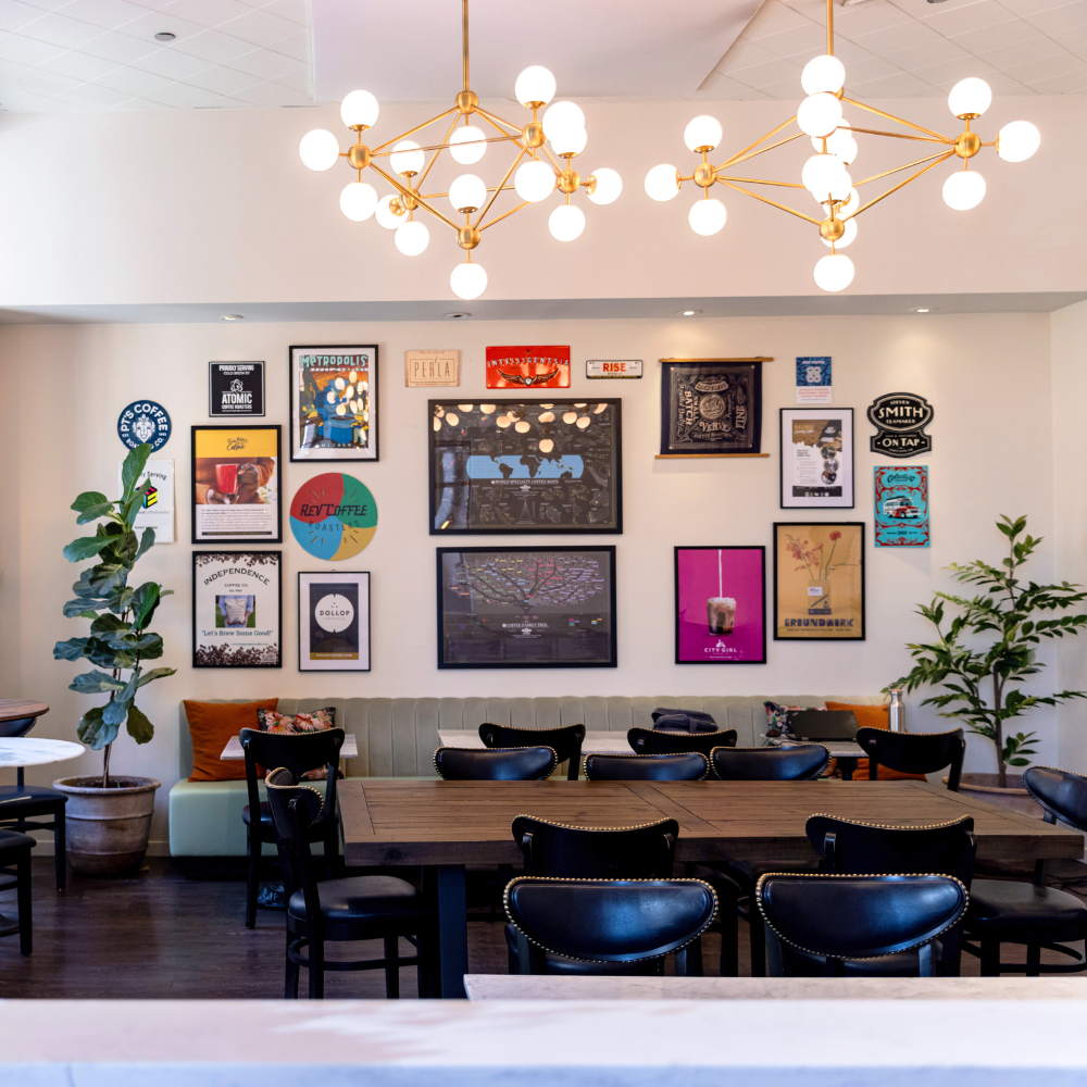 Café wall with posters, colorful poster wall, coffee and tea café