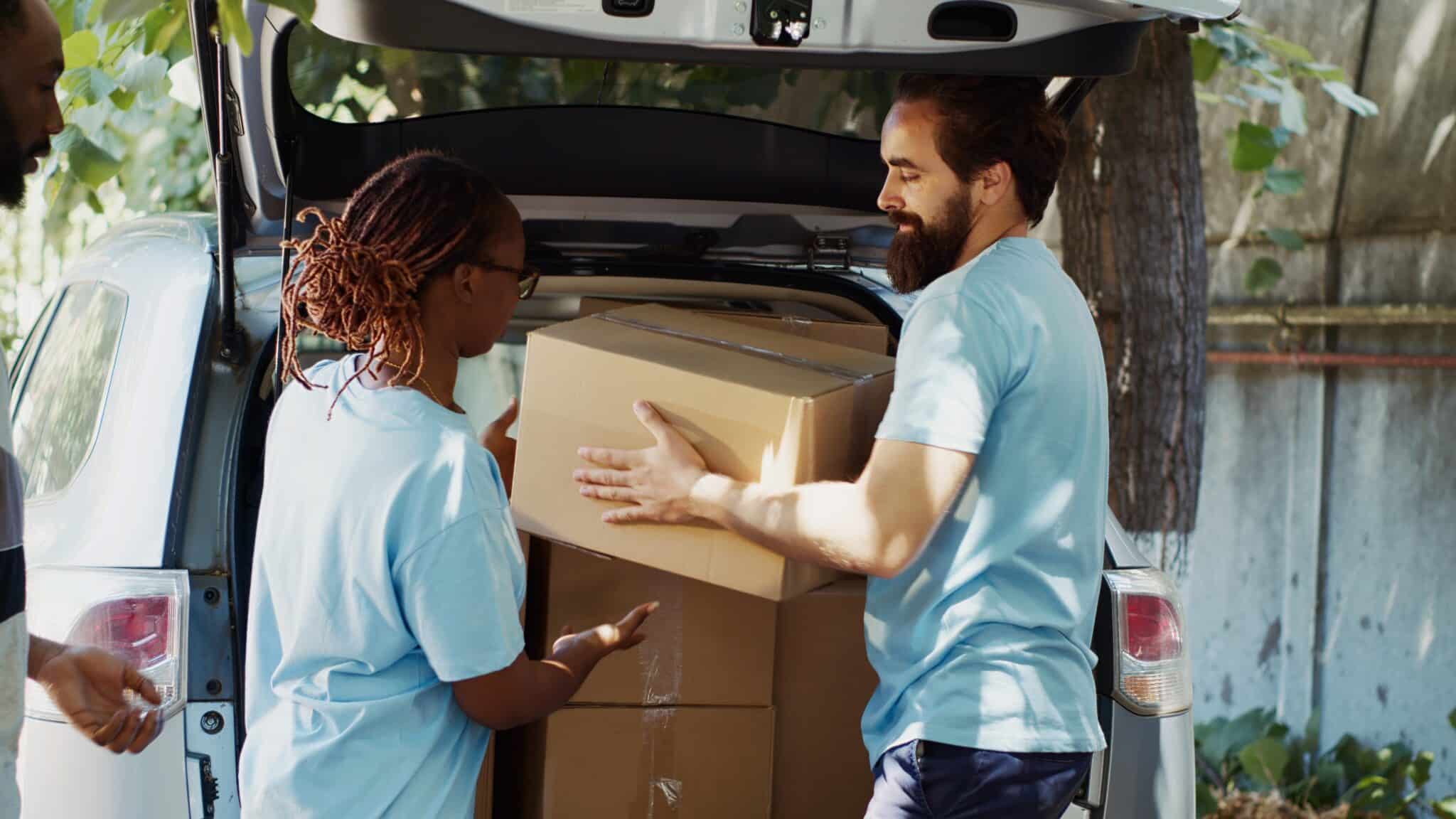 Man and woman donating boxes